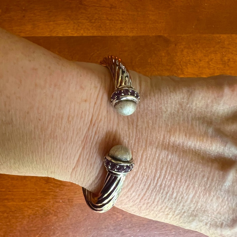 Beautiful sterling silver cuff with amethyst stones on end caps